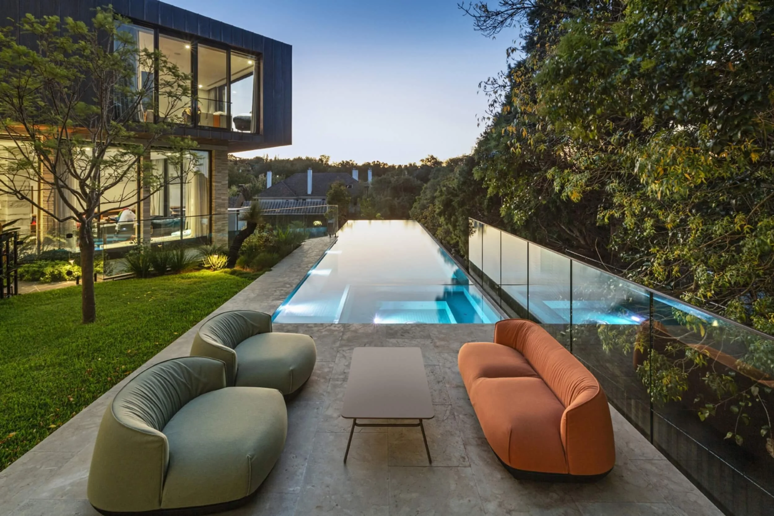 An architectural lap pool with still water.